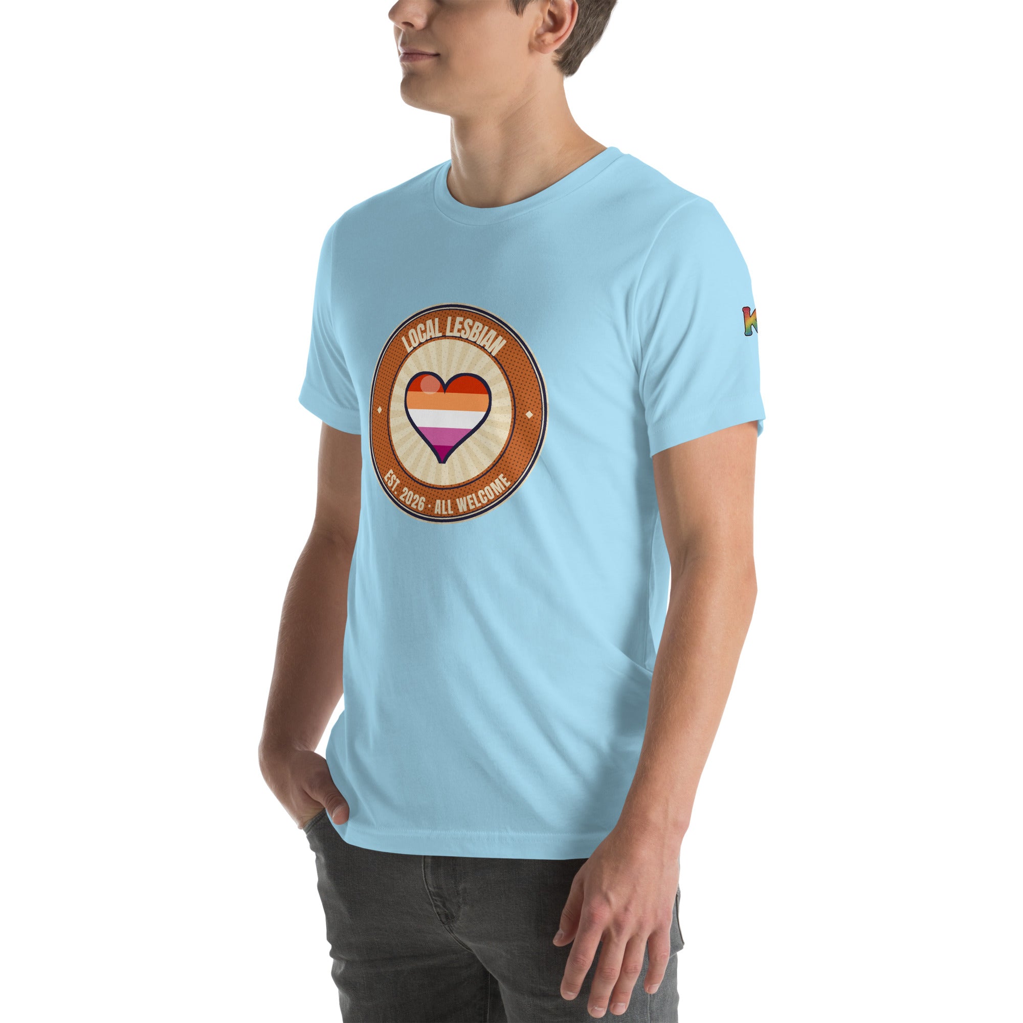 lesbian pride t-shirt — Local Lesbian badge design, ocean blue tee left-front angled view (sleeve K visible)