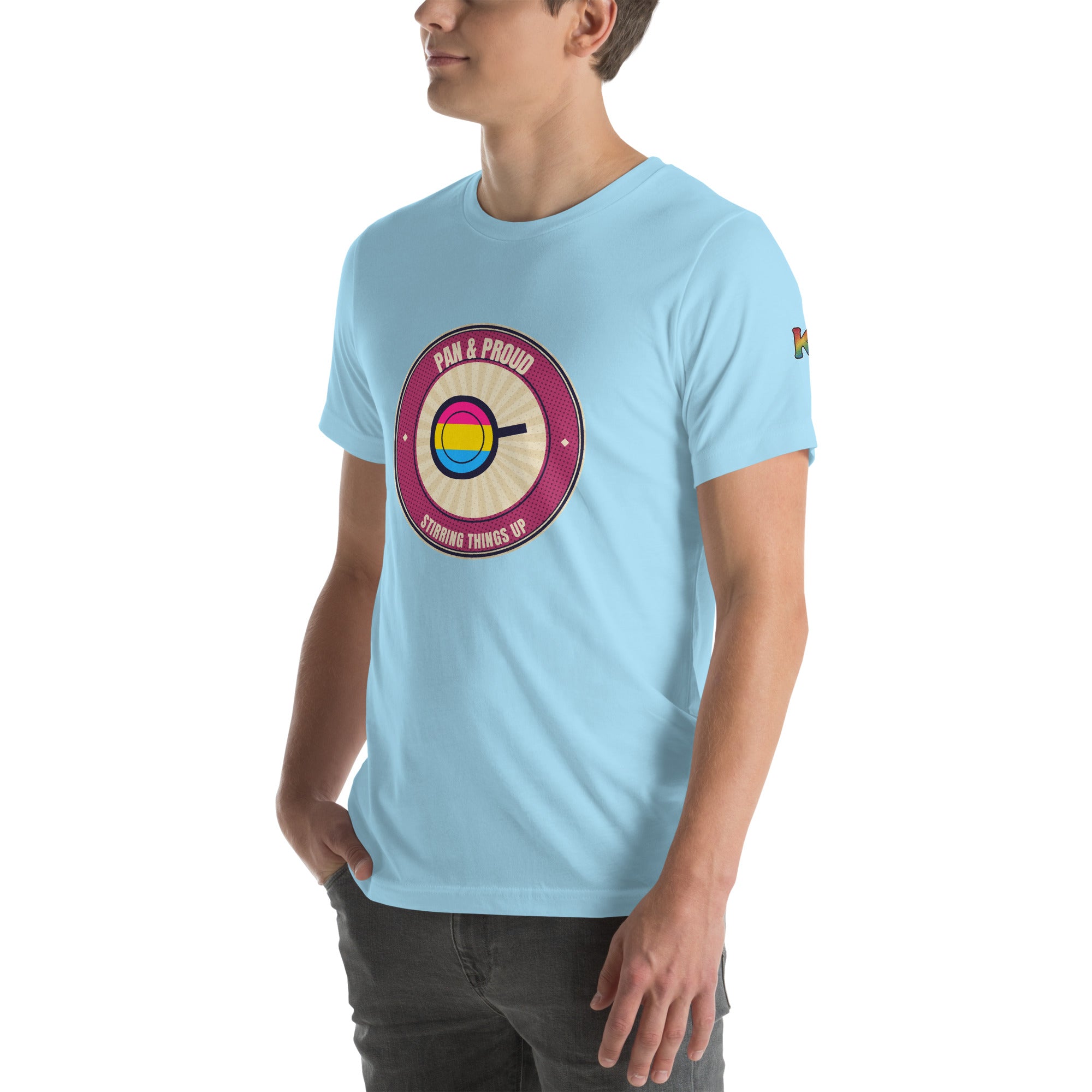 pansexual pride t-shirt — Pan & Proud badge design, ocean blue tee left-front angled view (sleeve K visible)