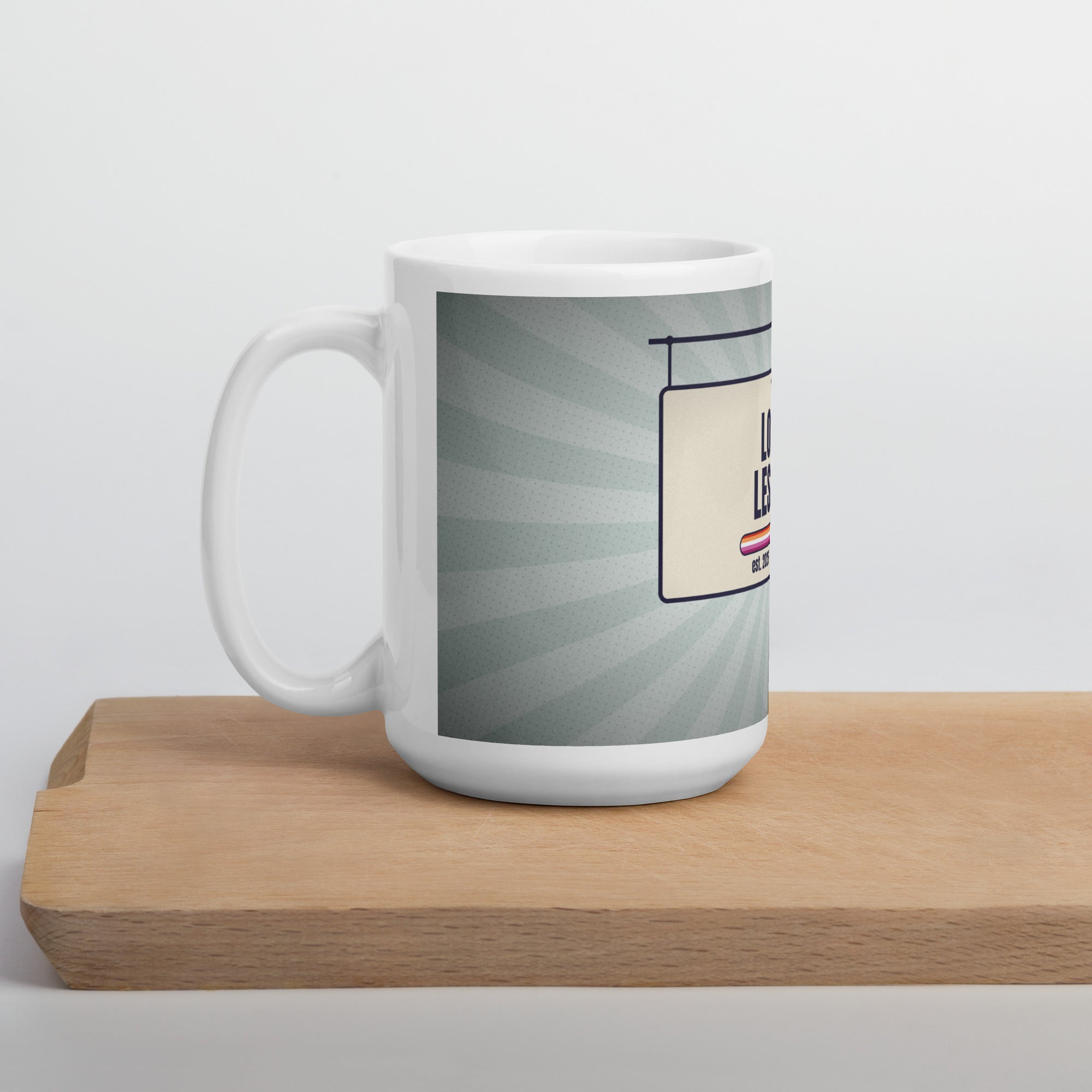 lesbian pride mug — Local Lesbian design, 15oz mug on a kitchen cutting board