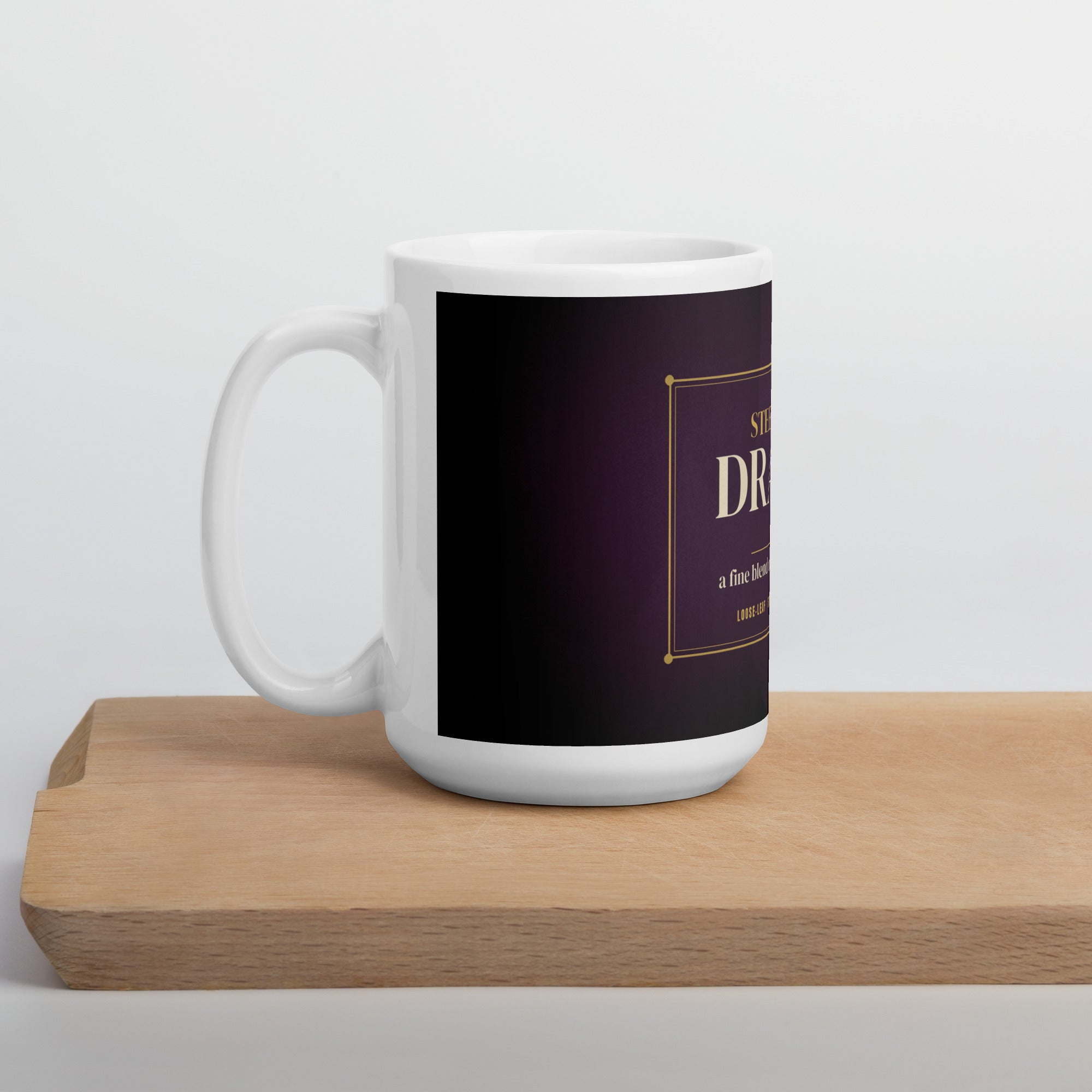 LGBTQ+ pride mug — Steeped in Drama design, 15oz mug on a kitchen cutting board