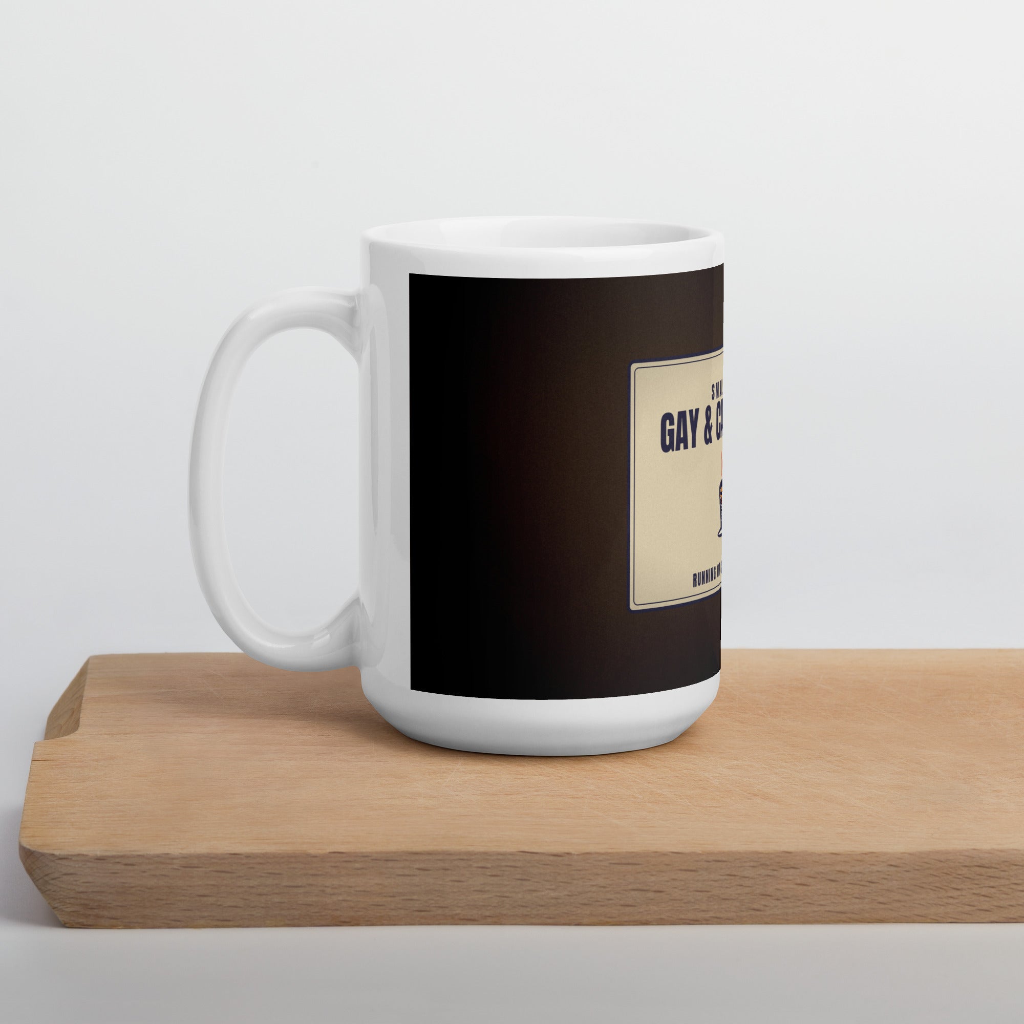 gay pride mug — Gay & Caffeinated design, 15oz mug on a kitchen cutting board