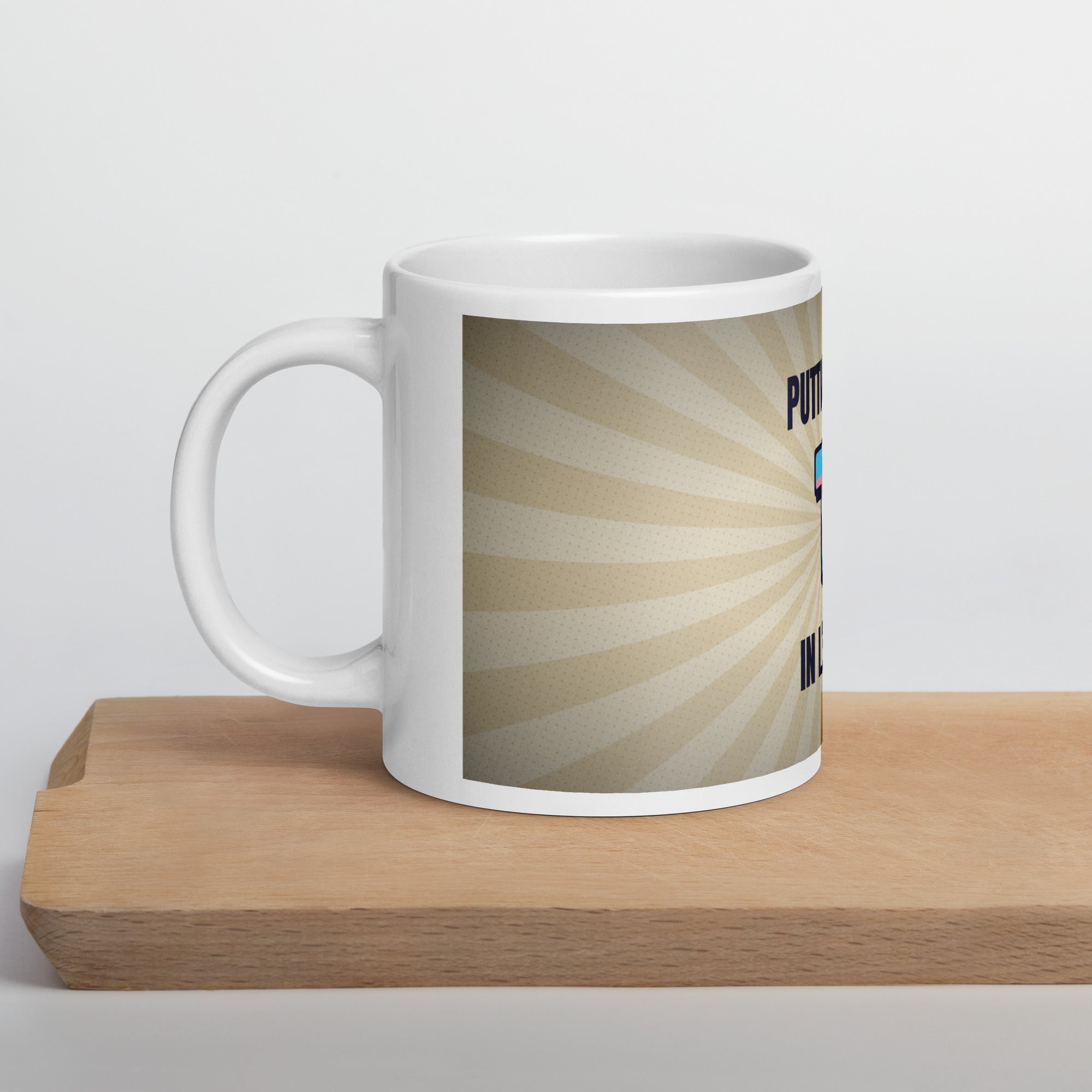 transgender pride mug — Putting the T design, 20oz mug on a kitchen cutting board