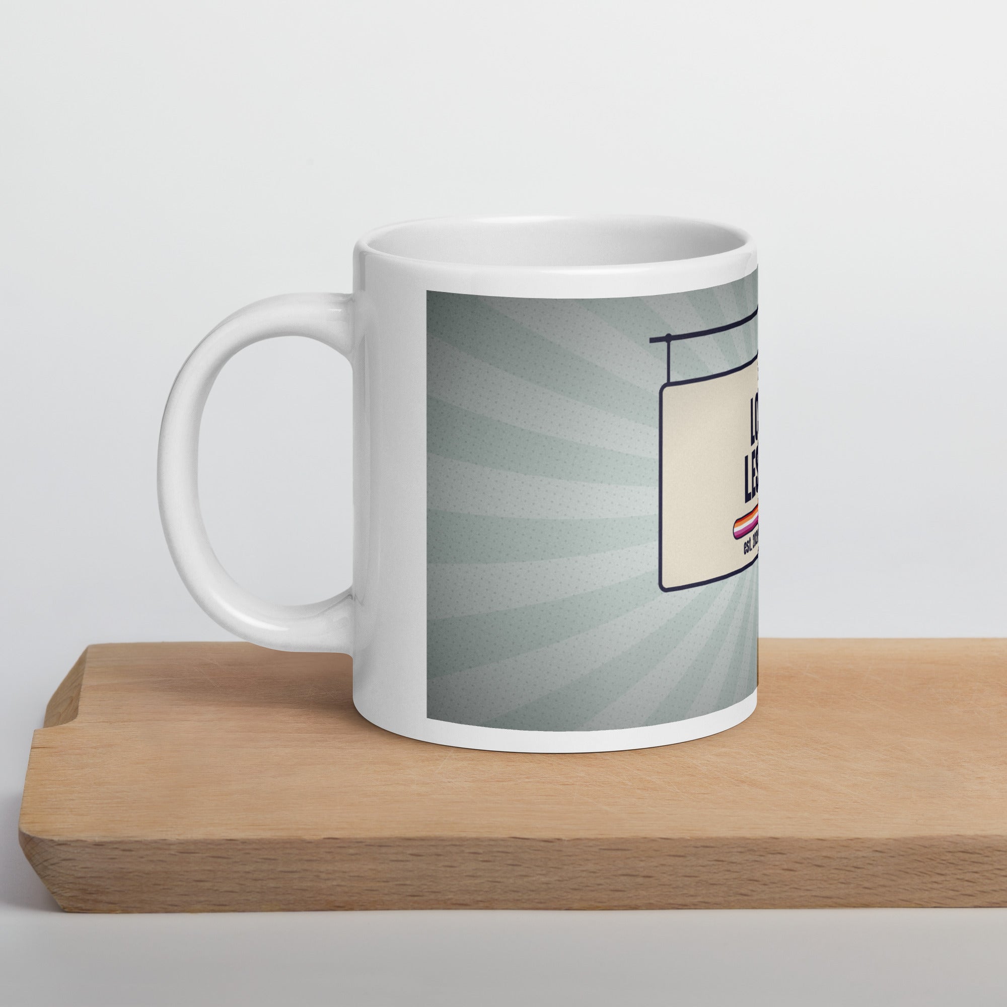 lesbian pride mug — Local Lesbian design, 20oz mug on a kitchen cutting board